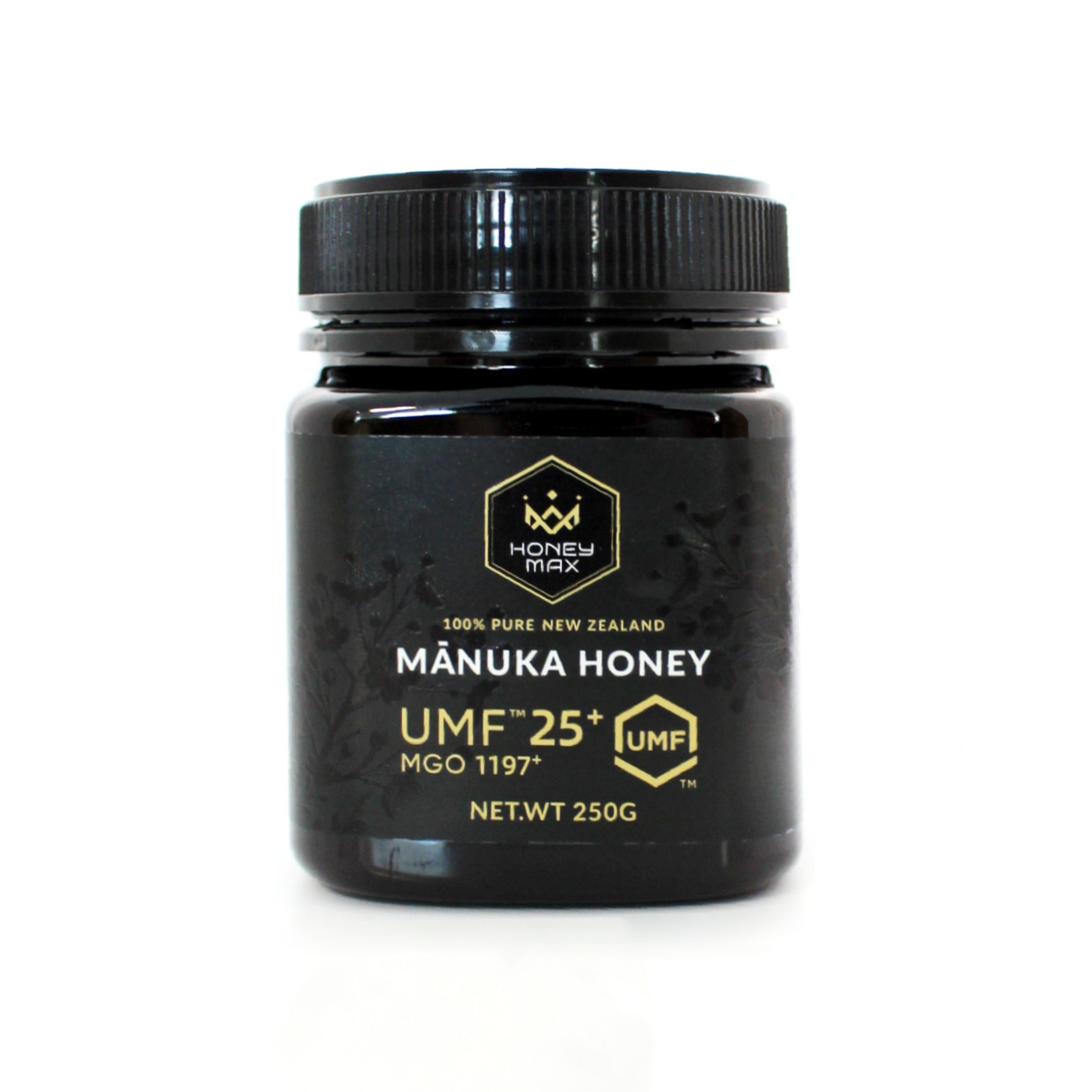 Manuka honey jar with black lid on a white background